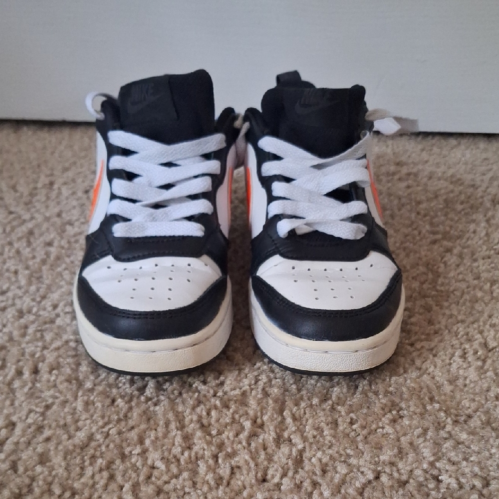 Nike Kids Black, White, and Orange Sneakers